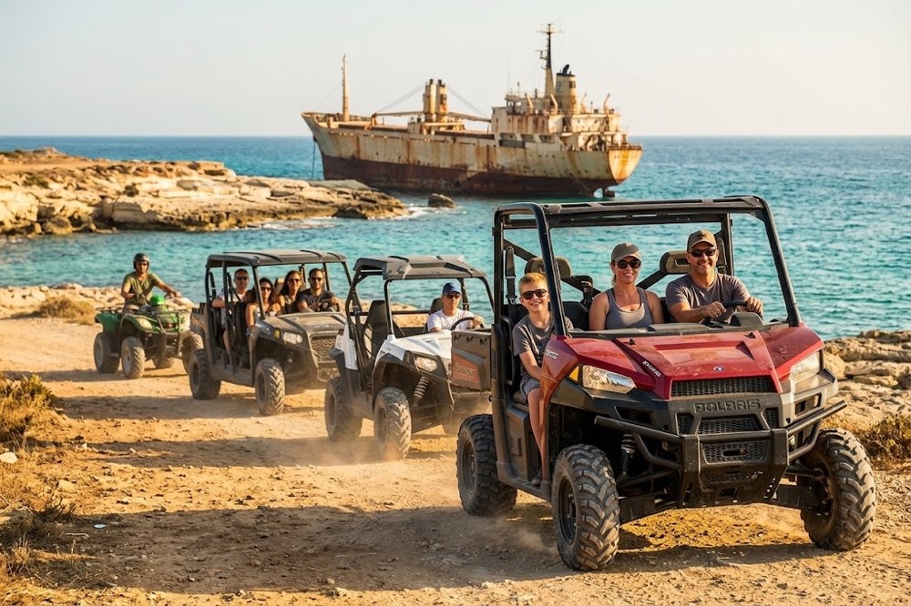 Red Polaris Ranger three-seater leading a safari convoy toward the EDRO III shipwreck near Paphos